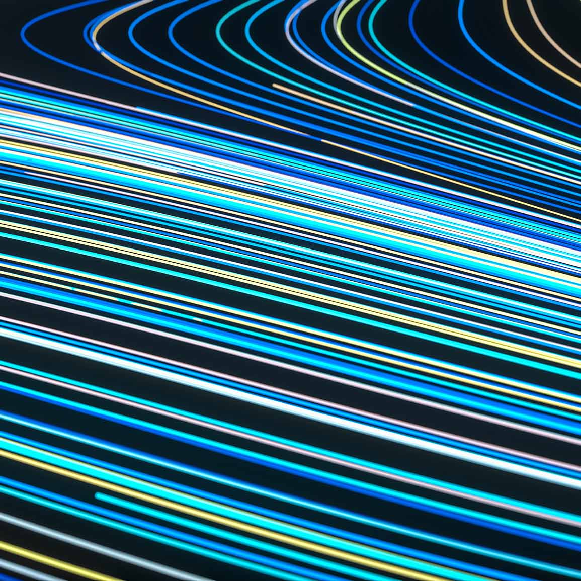 Blue lines moving in the same direction in an abstract representation of technology