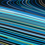 Multiple streams of colored light flow in parallel, symbolizing the diverse yet coordinated strategies managed by financial subadvisors.