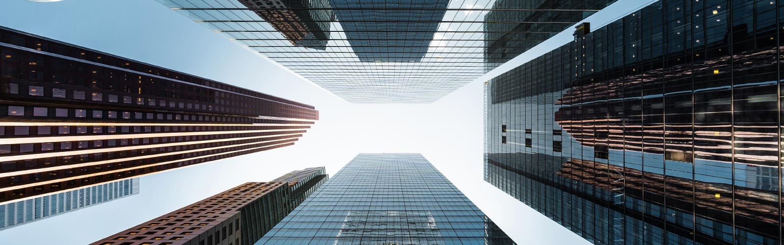 Low-angle view of city skyscrapers against the sky